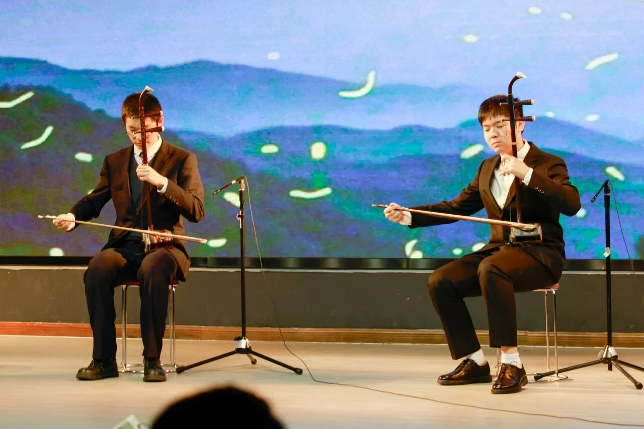 Erhu players performing on stage